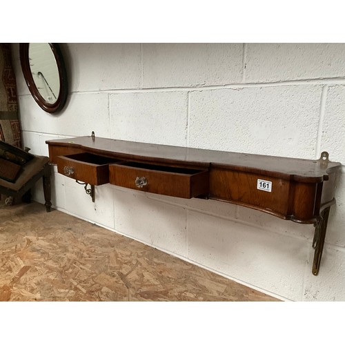 161 - VICTORIAN MAHOGANY SERPENTINE FRONTED CONSOLE WALL SHELF WITH 2 DRAWERS SUPPORTED ON BRASS DECORATIV... 