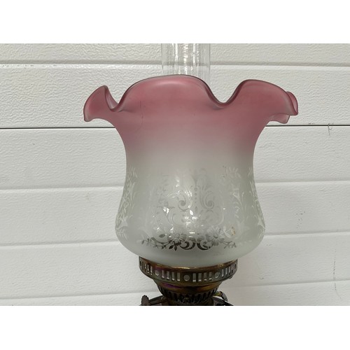 169 - VICTORIAN BRASS OIL LAMP WITH RUBY RED BOWL AND ETCHED GLASS SHADE (CONVERTED TO ELECTRIC) H24”