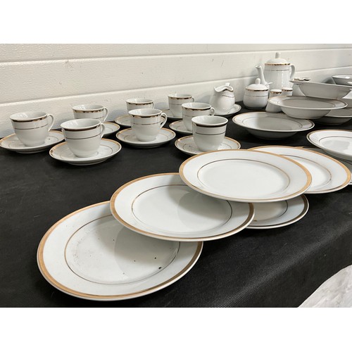 32 - LARGE FORTY NINE PIECE MODERN WHITE CHINA TEA AND DINNER SERVICE WITH GOLD RIM DECORATION