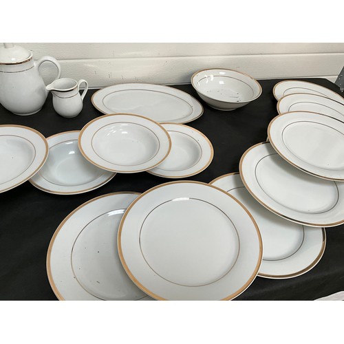 32 - LARGE FORTY NINE PIECE MODERN WHITE CHINA TEA AND DINNER SERVICE WITH GOLD RIM DECORATION