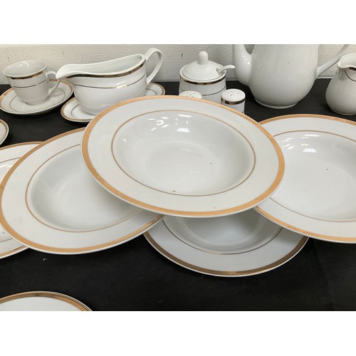 32 - LARGE FORTY NINE PIECE MODERN WHITE CHINA TEA AND DINNER SERVICE WITH GOLD RIM DECORATION