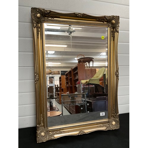 39 - REPRODUCTION GILT DECORATIVE FRAMED BEVELLED EDGE WALL MIRROR 36” x 26”