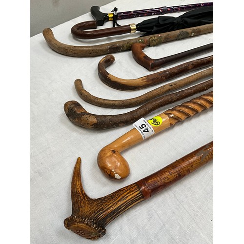 45 - COLLECTION OF WALKING STICKS AND VINTAGE UMBRELLAS