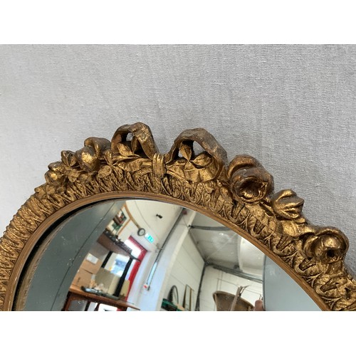 48 - VINTAGE CIRCULAR CONVEX WALL MIRROR IN DECORATIVE GILT FRAME DIA14”