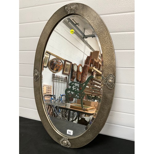 50 - ARTS AND CRAFTS HAMMERED STEEL FRAMED BEVELLED EDGE OVAL WALL MIRROR 36” x 23”