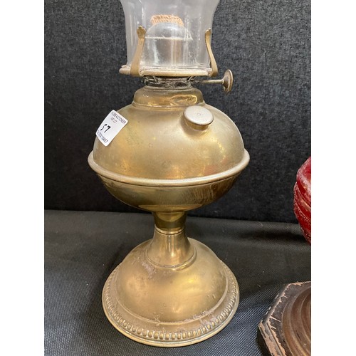 57 - 2 BRASS OIL LAMPS AND VICTORIAN OIL LAMP WITH RED GLASS BOWL