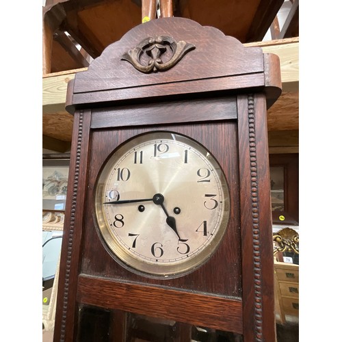 66 - VINTAGE OAK CASED WALL CLOCK WITH KEY AND PENDULUM H33” W13” D7”