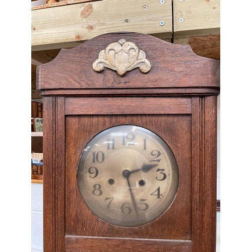 121 - VINTAGE OAK CASED WALL CLOCK WITH PENDULUM AND KEY H30”