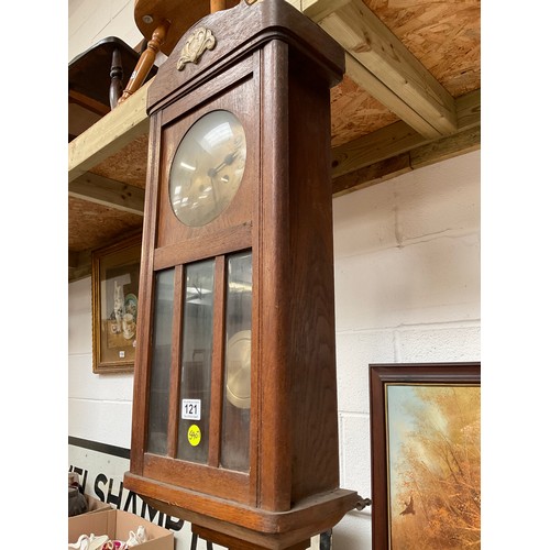 121 - VINTAGE OAK CASED WALL CLOCK WITH PENDULUM AND KEY H30”