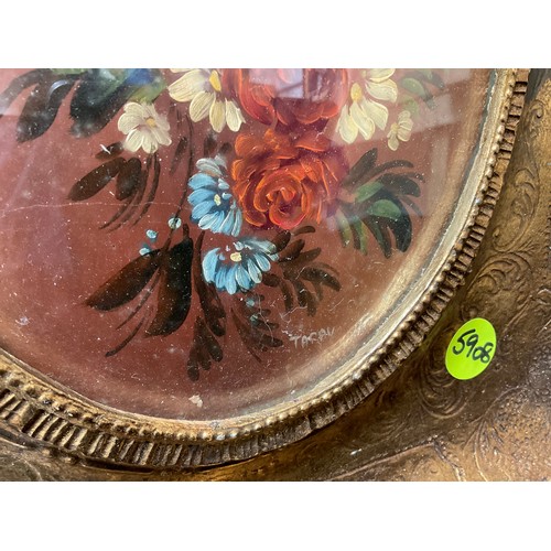 134 - GILT FRAMED OVAL OILS (FLOWERS) SIGNED TARAY 16” x 14”