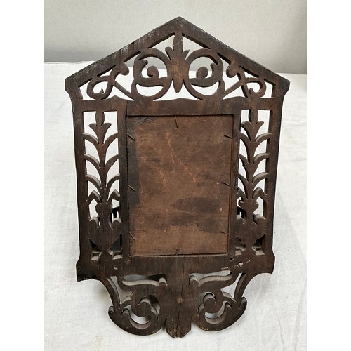 147 - MAHOGANY FRAMED FRET WORK MIRROR WITH BOWED AND GALLERIED SHELF  16” x 10”