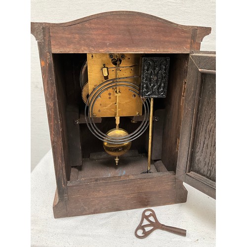 148 - VINTAGE DARK OAK MANTLE CLOCK WITH BARLEY TWIST DECORATION WITH KEY AND PENDULUM H11”W9”D6” AND VINT... 