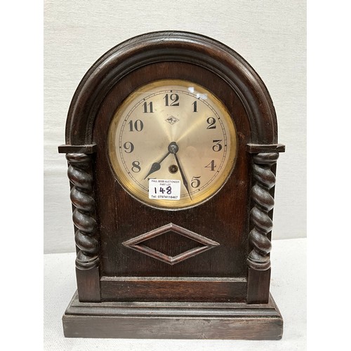 148 - VINTAGE DARK OAK MANTLE CLOCK WITH BARLEY TWIST DECORATION WITH KEY AND PENDULUM H11”W9”D6” AND VINT... 