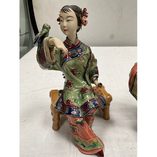 158 - PAIR OF CERAMIC CHINESE SEATED LADY FIGURES WITH IMPRESSED MARKS TO BASE H8”