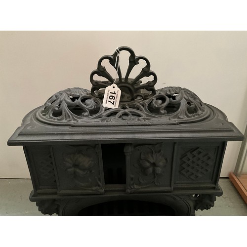 167 - ORNATE CAST IRON STOVE OF SMALL PROPORTIONS (POSSIBLY OFF A NARROW BOAT) H21” W22” D17”