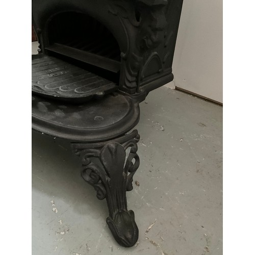 167 - ORNATE CAST IRON STOVE OF SMALL PROPORTIONS (POSSIBLY OFF A NARROW BOAT) H21” W22” D17”