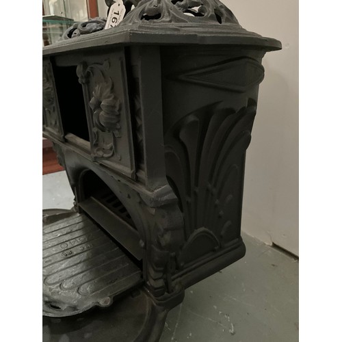 167 - ORNATE CAST IRON STOVE OF SMALL PROPORTIONS (POSSIBLY OFF A NARROW BOAT) H21” W22” D17”