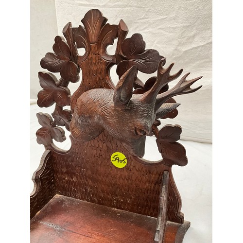 181 - CARVED OAK STAGS HEAD WALL SHELF AND A CORNER SHELF