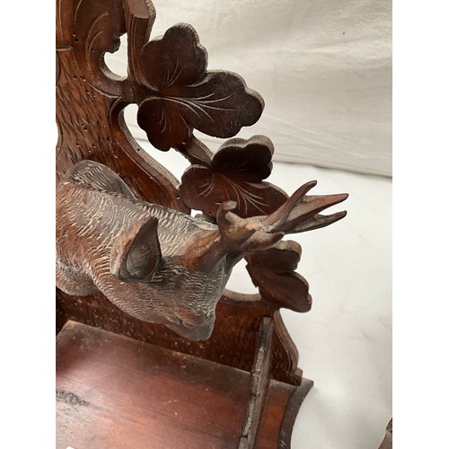 181 - CARVED OAK STAGS HEAD WALL SHELF AND A CORNER SHELF