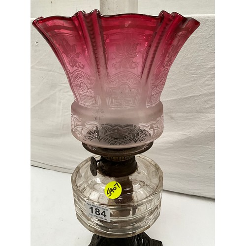 184 - VICTORIAN CAST IRON BASED OIL LAMP WITH CLEAR GLASS BOWL ORIGINAL COLOURED AND ENGRAVED GLASS SHADE ... 