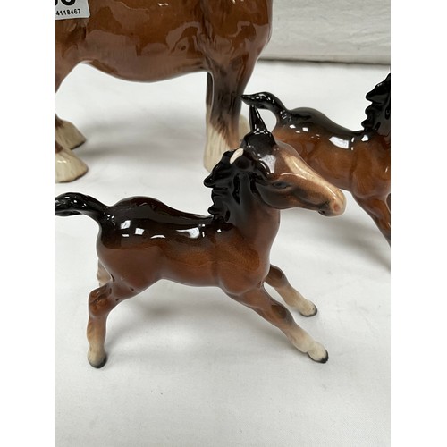 185 - BESWICK SHIRE HORSE AND TWO BESWICK FOALS (ONE FOAL HAS LOST HIS EAR)