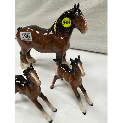 185 - BESWICK SHIRE HORSE AND TWO BESWICK FOALS (ONE FOAL HAS LOST HIS EAR)