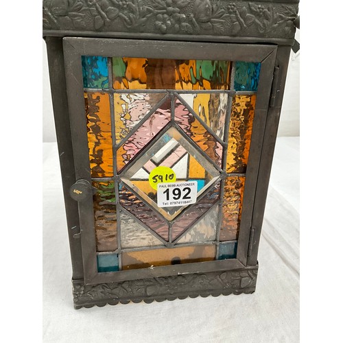 192 - BRASS WALL LANTERN WITH COLOURED GLASS PANELS H11” AND 8” SQUARE A/F