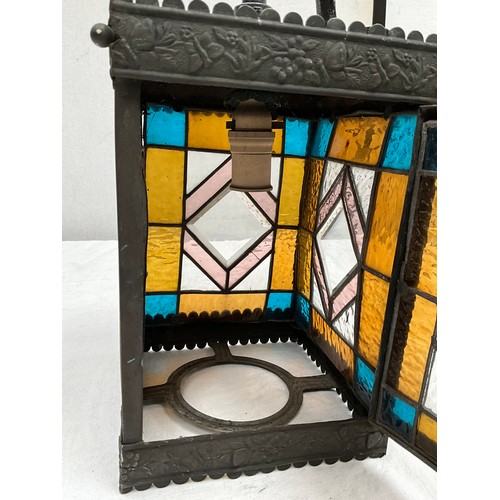 192 - BRASS WALL LANTERN WITH COLOURED GLASS PANELS H11” AND 8” SQUARE A/F