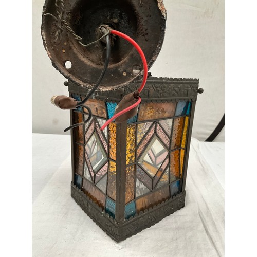 192 - BRASS WALL LANTERN WITH COLOURED GLASS PANELS H11” AND 8” SQUARE A/F