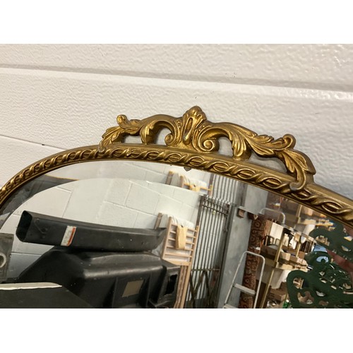 278 - DECORATIVE GILT FRAMED OVAL BEVEL EDGED WALL MIRROR 34” x 24”