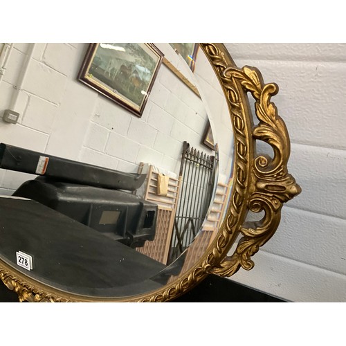 278 - DECORATIVE GILT FRAMED OVAL BEVEL EDGED WALL MIRROR 34” x 24”