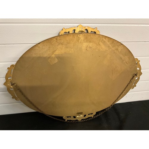 278 - DECORATIVE GILT FRAMED OVAL BEVEL EDGED WALL MIRROR 34” x 24”