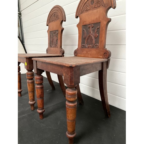 288 - PAIR OF EDWARDIAN MAHOGANY CARVED SHIELD BACK HALL CHAIRS.