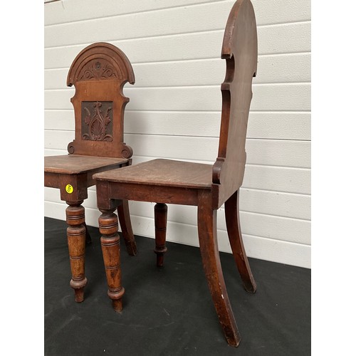 288 - PAIR OF EDWARDIAN MAHOGANY CARVED SHIELD BACK HALL CHAIRS.