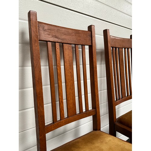 290 - PAIR OF GOLDEN OAK DINING CHAIRS WITH UPHOLSTERED SEATS