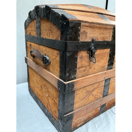 296 - VICTORIAN OAK AND IRON BANDED DOME TOP TRAVEL CHEST H24” W33” D19”