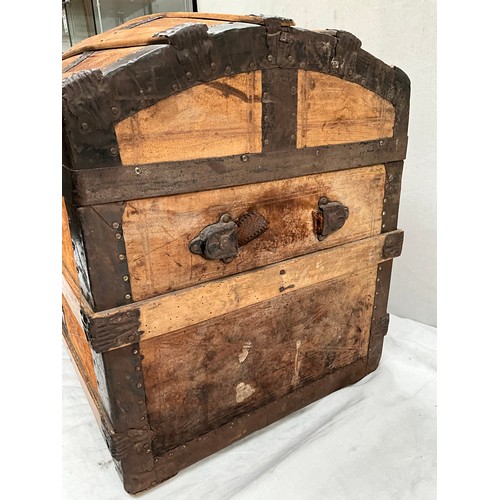 296 - VICTORIAN OAK AND IRON BANDED DOME TOP TRAVEL CHEST H24” W33” D19”