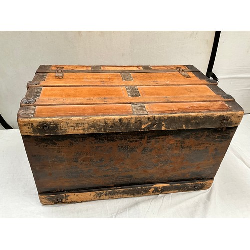 296 - VICTORIAN OAK AND IRON BANDED DOME TOP TRAVEL CHEST H24” W33” D19”