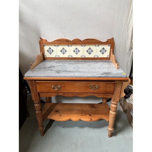 306 - VICTORIAN STRIPPED PINE WASHSTAND WITH MARBLE TOP AND TILED BACK  H41” W38” D20”