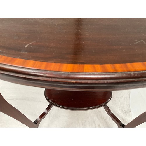 369 - EDWARDIAN MAHOGANY INLAID OVAL WINDOW TABLE A/F 
H28” W29” D20”