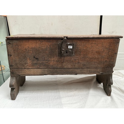 377 - EARLY OAK SWORD OR COFFER WITH CANDLE BOX TO INTERIOR WITH HANDMADE IRON HINGES AND CLASP 
H26”W44” ... 