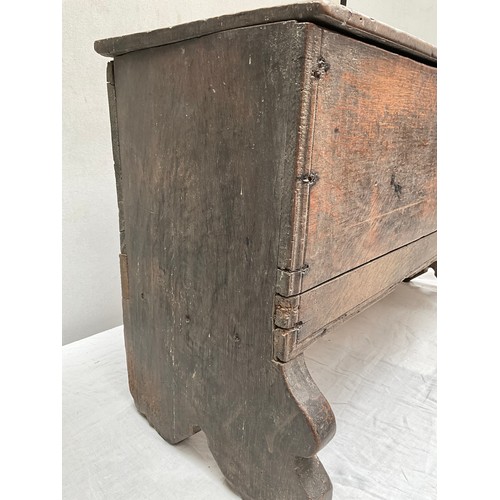 377 - EARLY OAK SWORD OR COFFER WITH CANDLE BOX TO INTERIOR WITH HANDMADE IRON HINGES AND CLASP 
H26”W44” ... 