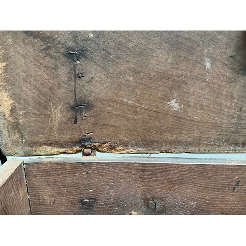 377 - EARLY OAK SWORD OR COFFER WITH CANDLE BOX TO INTERIOR WITH HANDMADE IRON HINGES AND CLASP 
H26”W44” ... 