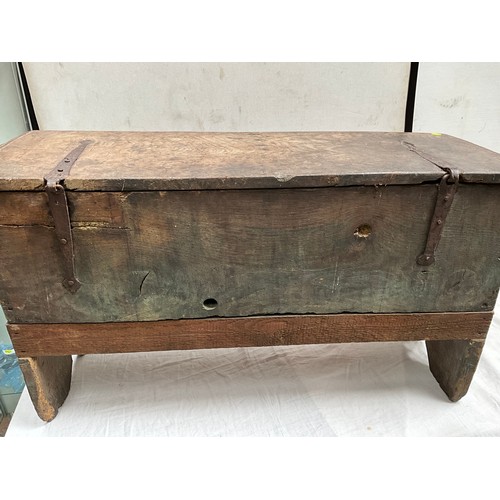 377 - EARLY OAK SWORD OR COFFER WITH CANDLE BOX TO INTERIOR WITH HANDMADE IRON HINGES AND CLASP 
H26”W44” ... 