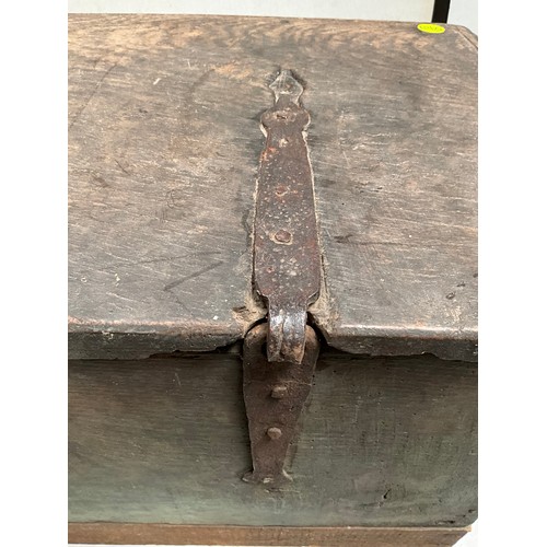 377 - EARLY OAK SWORD OR COFFER WITH CANDLE BOX TO INTERIOR WITH HANDMADE IRON HINGES AND CLASP 
H26”W44” ... 