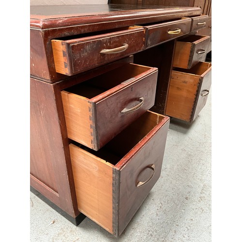 379 - VINTAGE MAHOGANY KNEEHOLE TWIN PEDESTAL DESK OF 7 DRAWERS AND INSET LEATHER TOP H31” W51” D31”