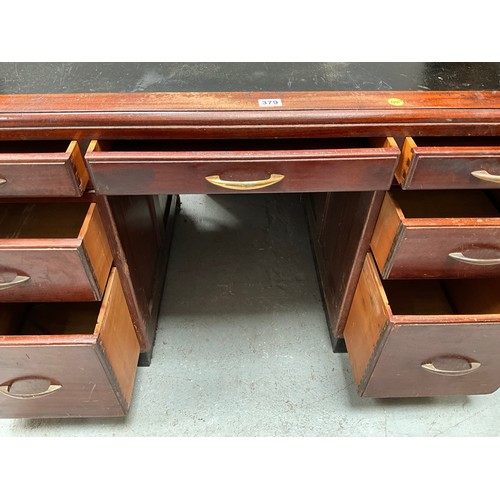 379 - VINTAGE MAHOGANY KNEEHOLE TWIN PEDESTAL DESK OF 7 DRAWERS AND INSET LEATHER TOP H31” W51” D31”