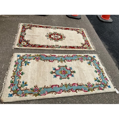 384 - TWO VINTAGE PATTERNED RUGS 78” x 39” AND 78” x 38”