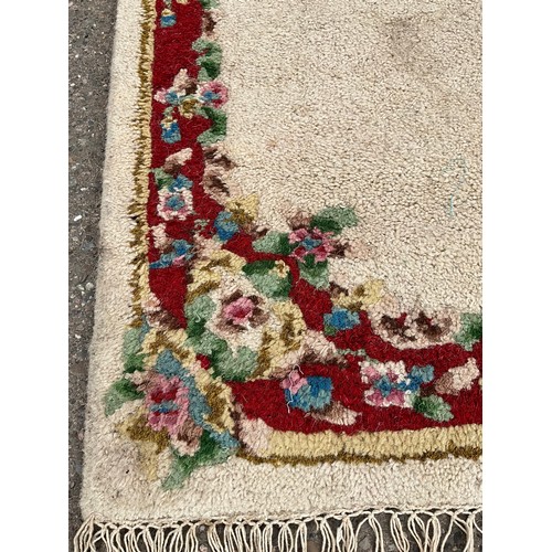 384 - TWO VINTAGE PATTERNED RUGS 78” x 39” AND 78” x 38”