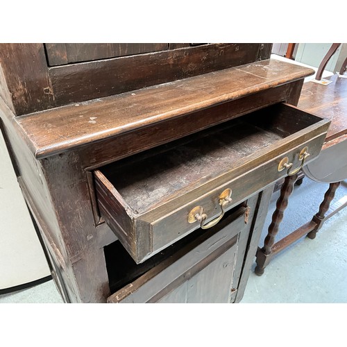 396 - EARLY OAK COURT CUPBOARD DATED 1738 WITH 2 DOORS OVER SINGLE DRAWER AND PANELED DOOR BELOW (BROKEN N... 